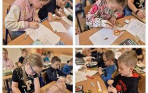 Uczniowie pracujący nad pudełeczkami